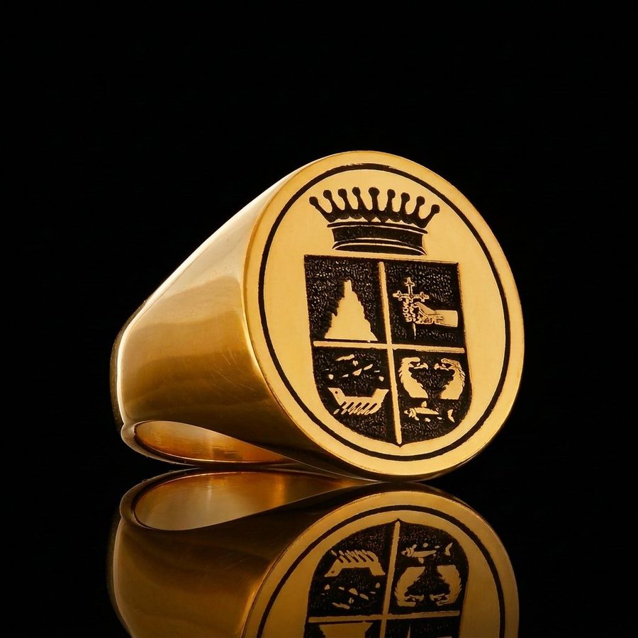 Gold signet ring engraved with a quartered coat of arms beneath a coronet
