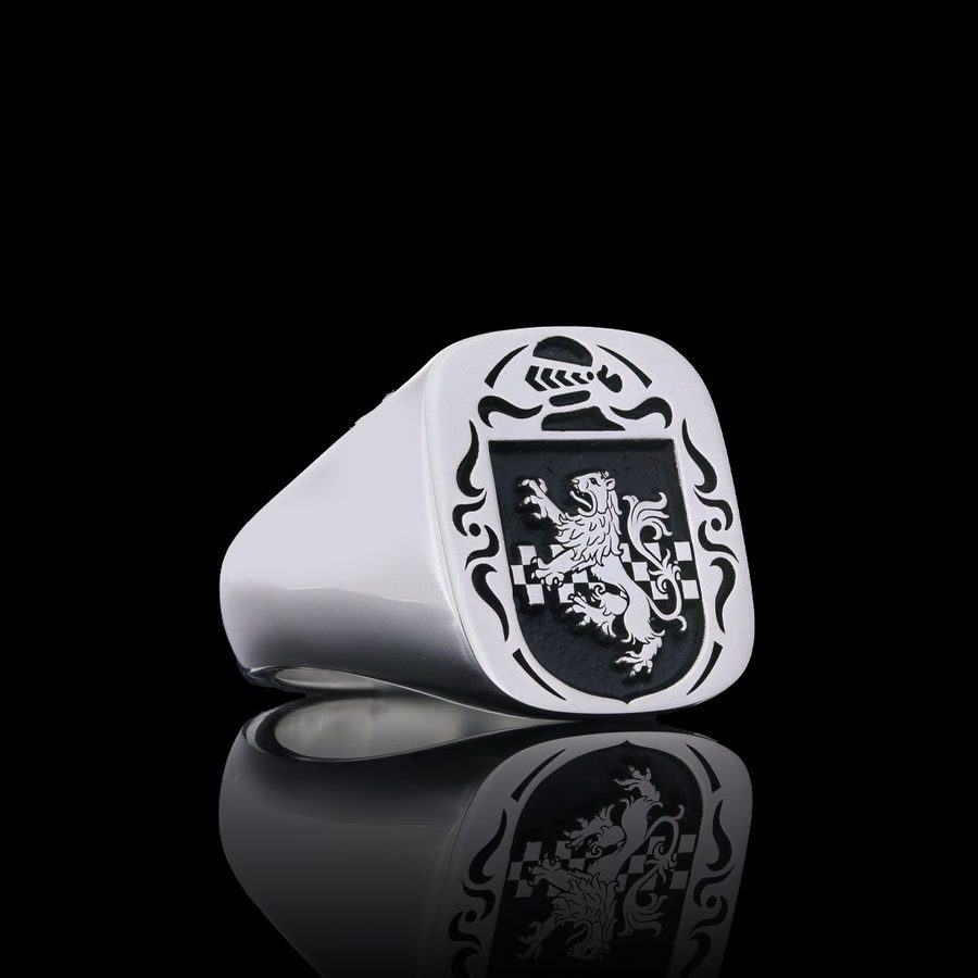 Silver cushion-shaped signet ring engraved with a lion rampant coat of arms and mantling